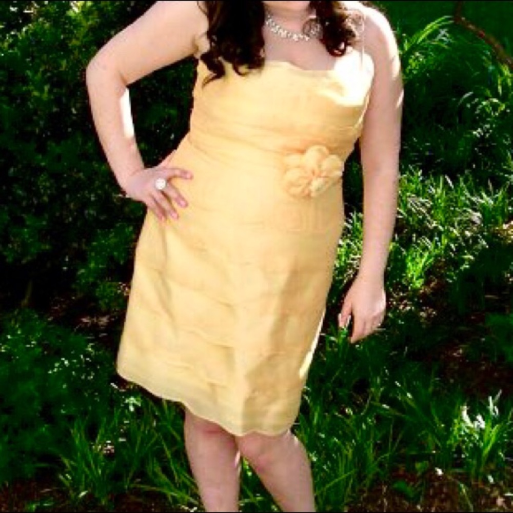 Light yellow, scallop tiered cocktail dress.